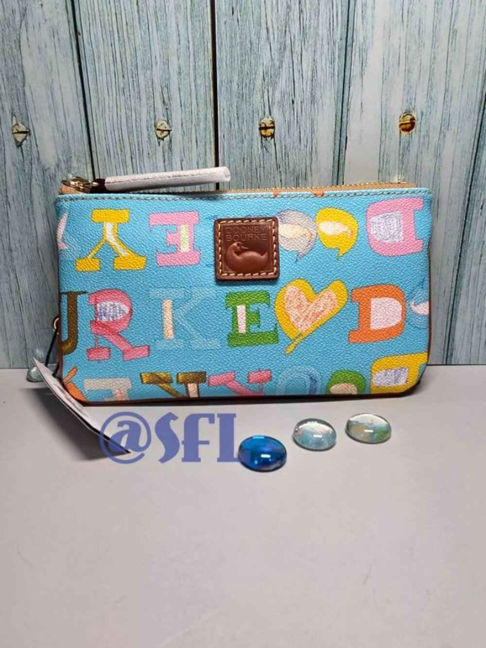Dooney & Bourke Doodle II Coated Cotton Medium Wristlet In Caribbean Blue